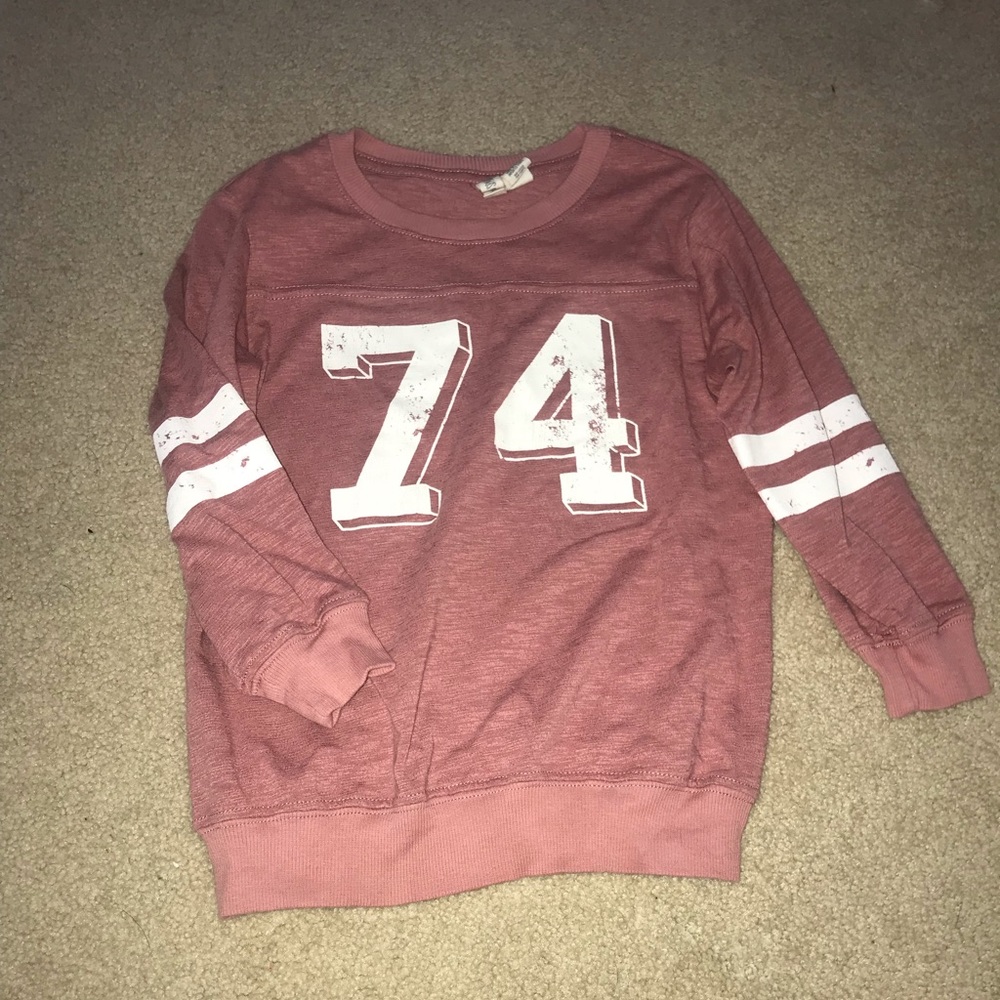 Light pink “74” medium sleeve shirt.
